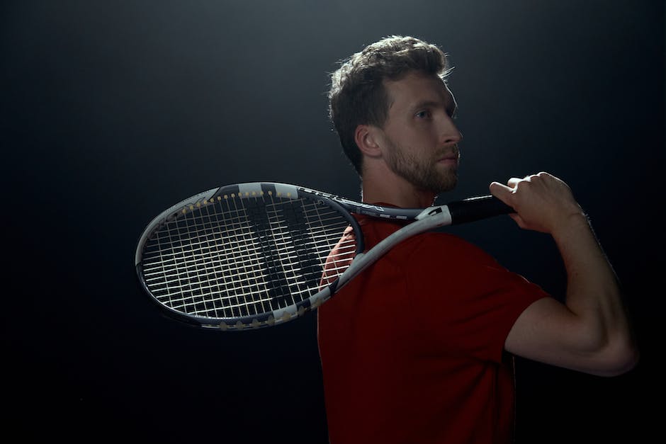 A photo of a tennis player hitting a powerful shot at the Australian Open