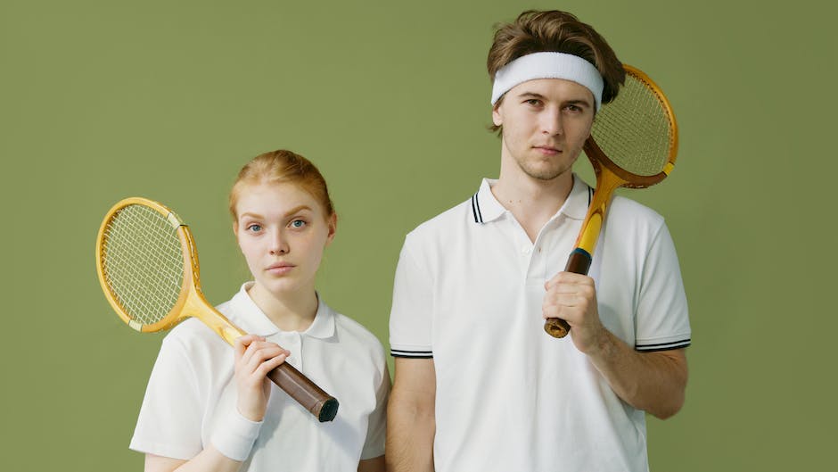 Image of dominant squash players and rising talent standing together on a court