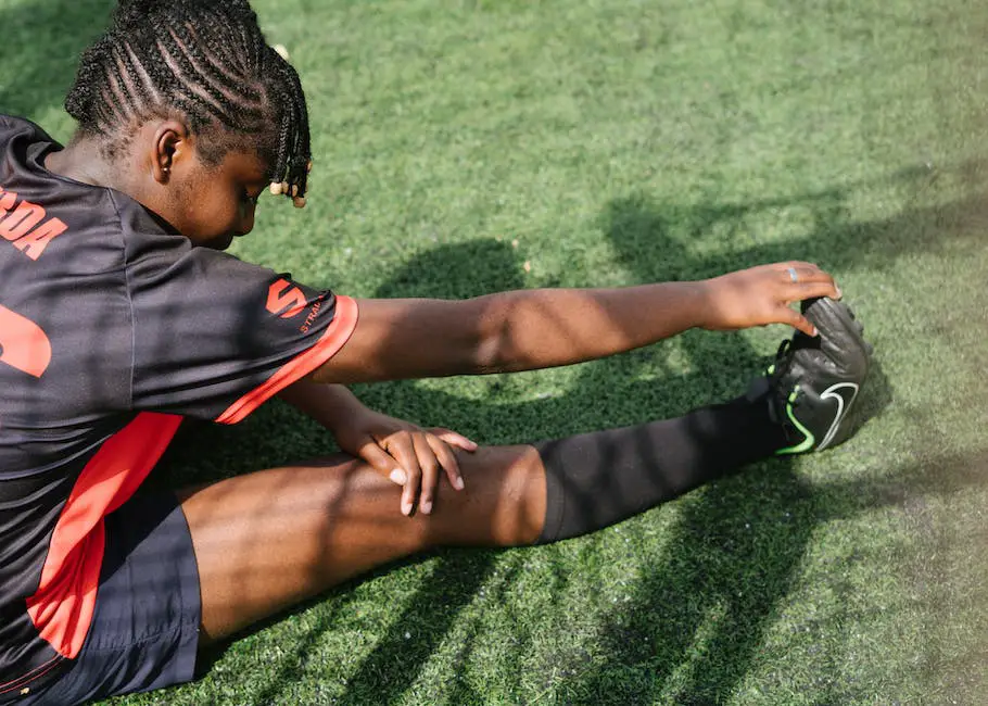 image of a tennis player stretching before a match